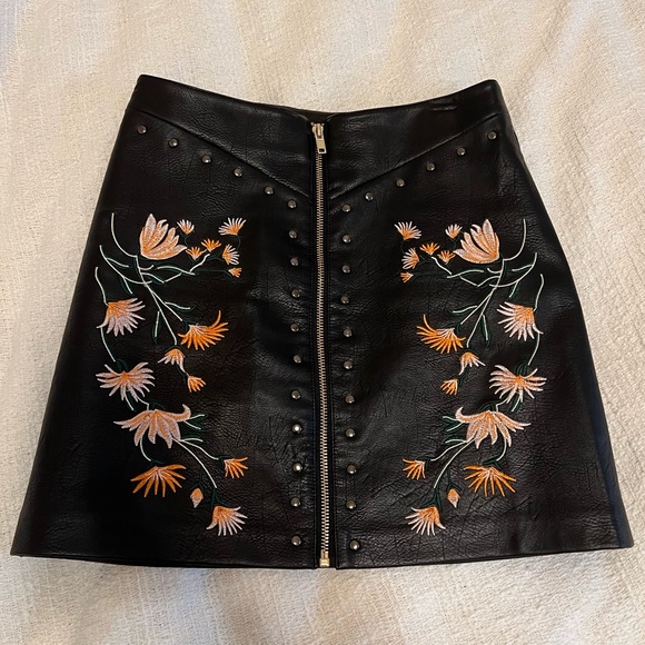 Ellison Dresses & Skirts - Leather studded mini skirt with floral embroidery size small